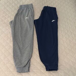 2 pairs of Nike Club Fleece Joggers - Gray, and Navy